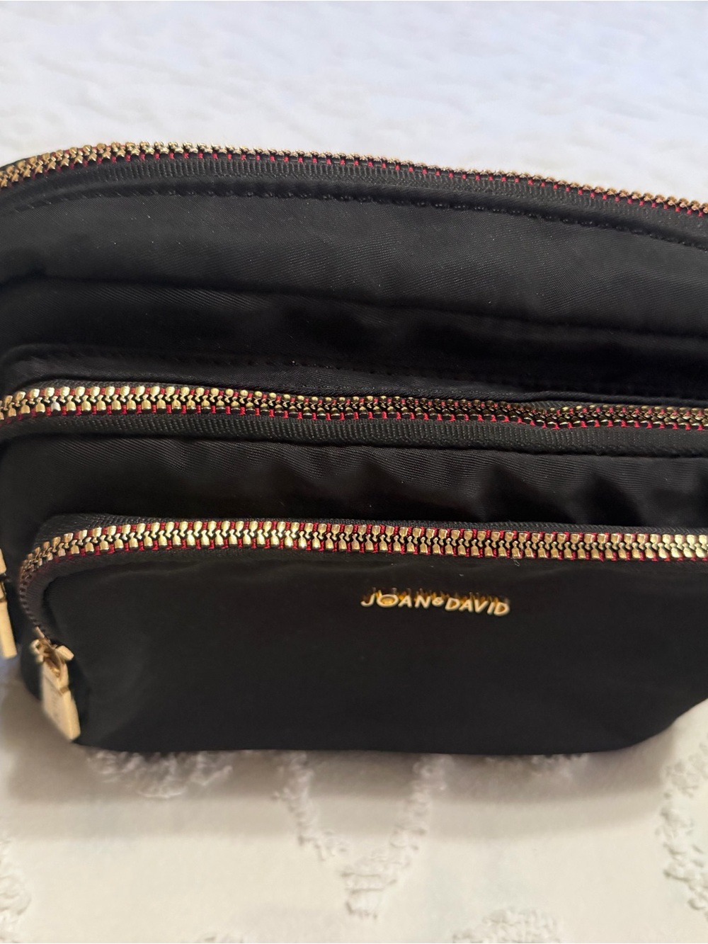 Joan & David Black crossbody with Gold Zippers